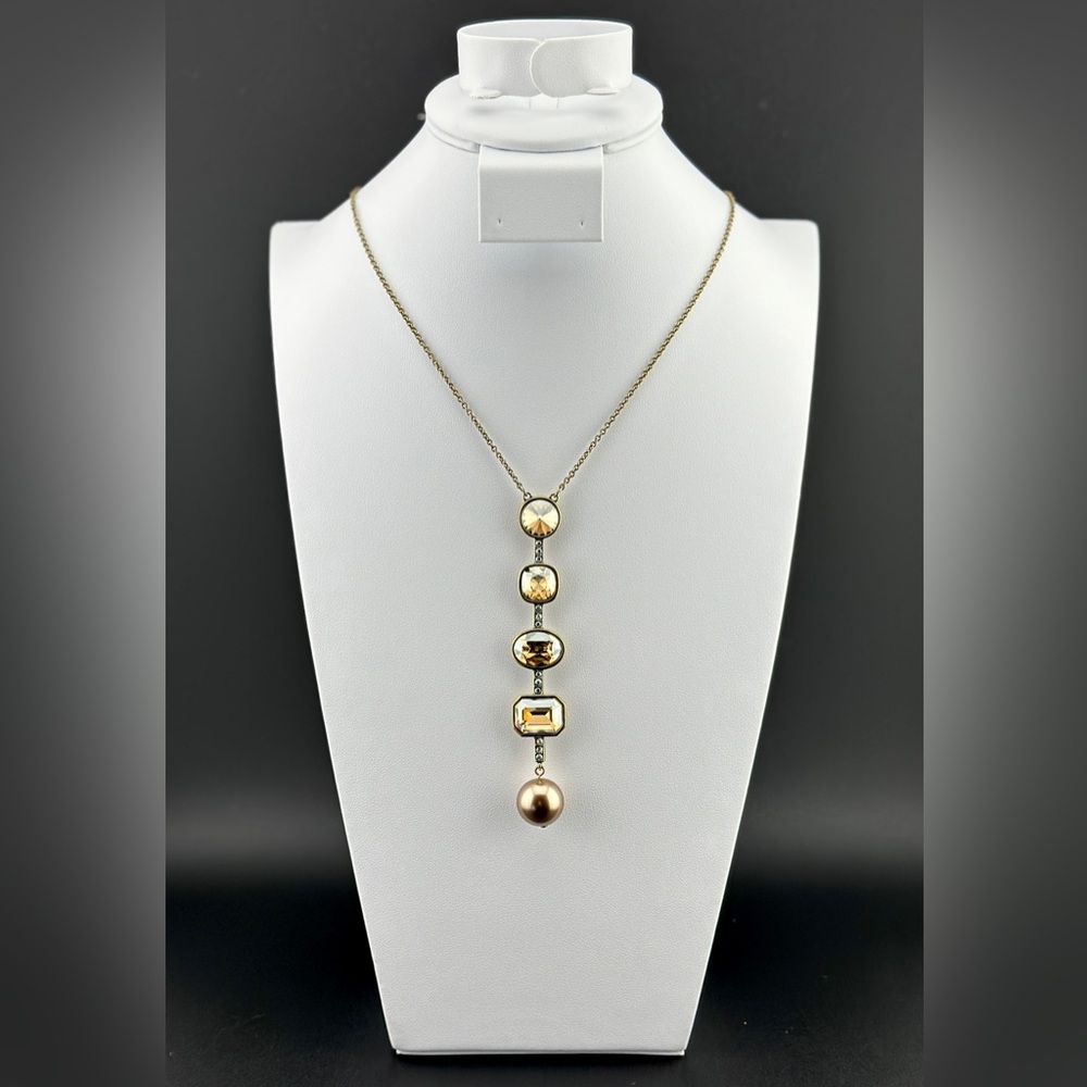 PLAYFUL Pendant 
Touchstone Crystal by Swarovski